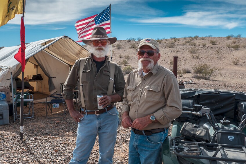 Jim Wharff (right) with Tom Koch (left) who received his 25 FCM membership award in 2019. Wharff occasionally camps in the canvas tent similar to those used during the nineteenth century. | Kim Stringfellow