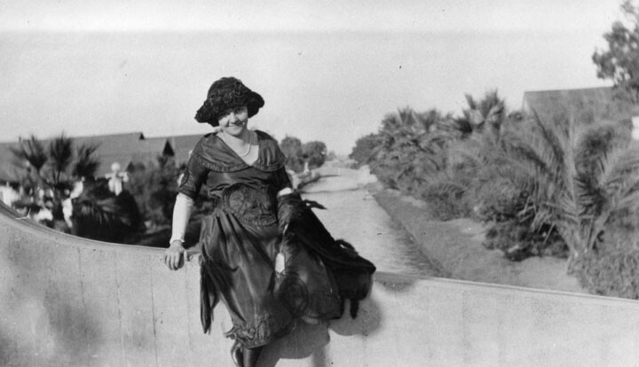 A woman poses on one of the canals' bridges. Courtesy of the Security Pacific National Bank Collection - Los Angeles Public Library.